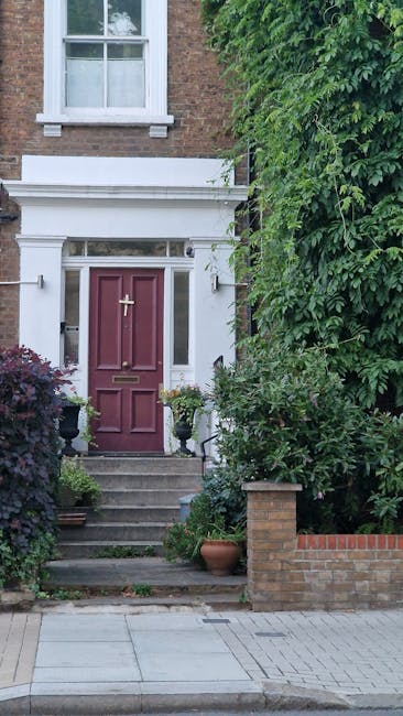 A close-up view of a brick wall with a street sign reading 'LOWER TERRACE NW3', indicating a specific location in a residential area. The bricks are textured with a mix of dark red and brown hues, and